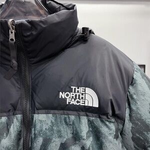The North Face Black and Teal Puffer Jacket